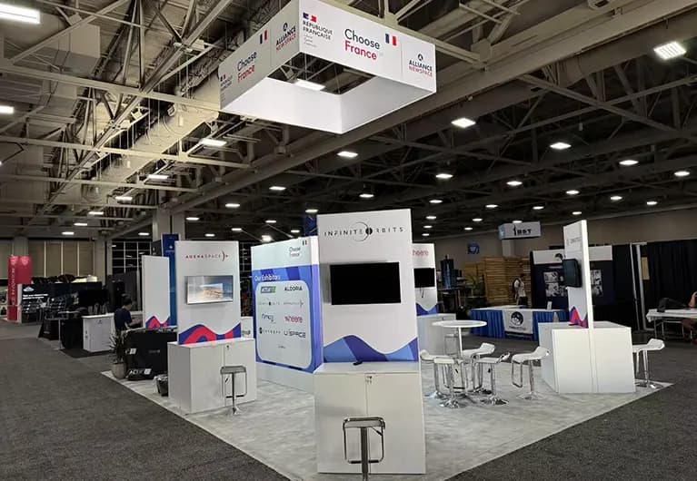 20x30 trade show booth rental for Business France at Small Satellite Conference 2025 Designed and Built by Triumfo Inc. in Salt Lake City, Utah